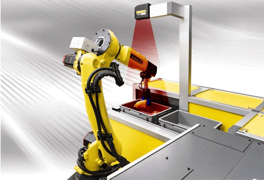 Fanuc yellow robot that has a laser beam to inspect product